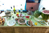 Еда — простая: самогонка, вино, варёная картошка, карасики из местного пруда, дыни и кукуруза, украденные с поля