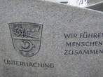 Герб на фонтане возле Ратхауза