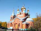 За стадионом — Богоявленская церковь, открытая в 1998 г.