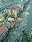 Вид с самого верхнего этажа отеля на харбинский вокзал.
