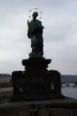Статуя св. Яна Непомуцкого на Карловом Мосту