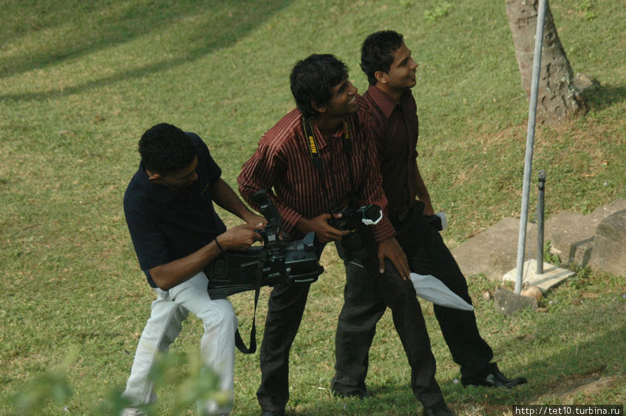 Человек и фотоаппарат Шри-Ланка