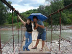 Анита Семичева и Олег Семичев на висячем мосту через реку Белая