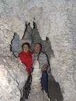 Сталактиты, сталагмиты и сталагматы в пещере Там Лот.