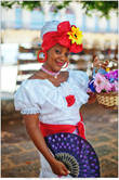 Кубинские женщины — сантерас. Про сантерию можно почитать в журнале: http://shelphur.livejournal.com/43819.html
