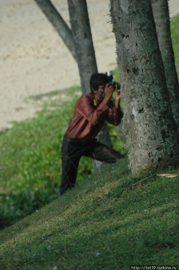 Человек и фотоаппарат Шри-Ланка