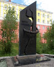 Памятник, посвященный жертвам НорильЛага у стен норильского краеведческого музея.
