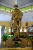 Золотая статуя монаха