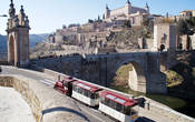 вид моста Алькантара с замком Алькасар
