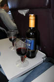 Каждый полет меня сопровождала бутылочка сухого красного вина, в Wizz Air она стоила 6 евро и было в ней 450 г