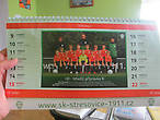 Внук Федя — член футбольной команды. Нам показывают календарь, где сфотографирована его команда