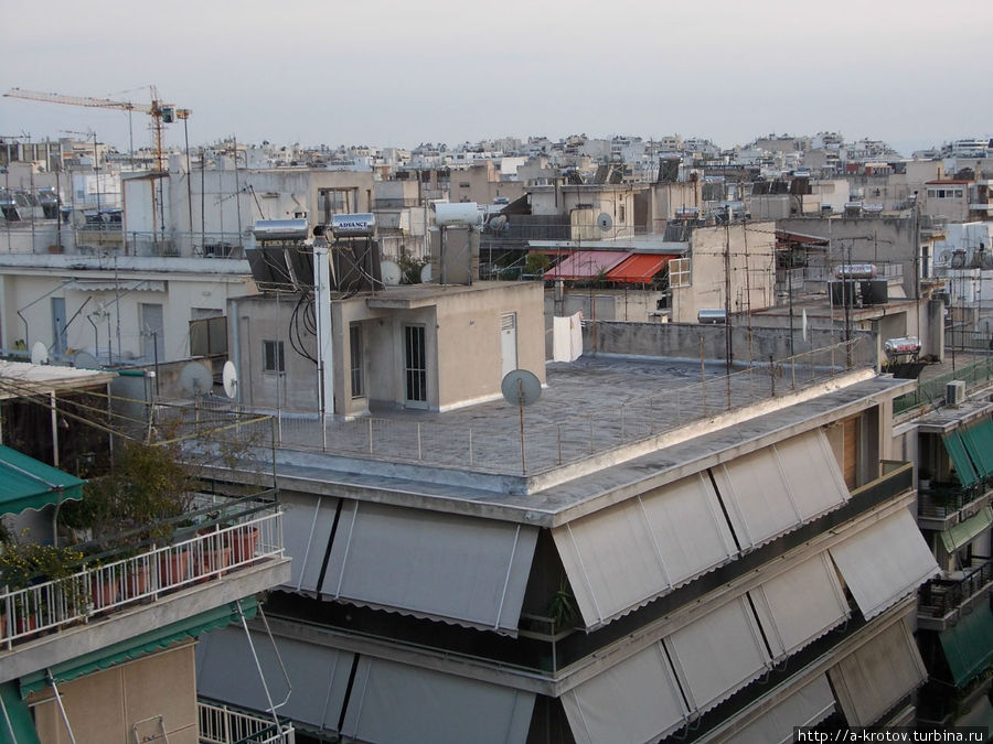 Так выглядит город с крыши дома Афины, Греция