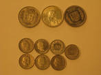 вот монеты разных лет.

Да, 5 франков = 165 рублей, супердорогая монета!